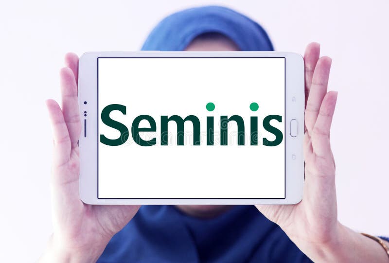 Logo of Seminis company on samsung tablet holded by arab muslim woman. Seminis is the largest developer, grower and marketer of fruit and vegetable seeds in the world. Logo of Seminis company on samsung tablet holded by arab muslim woman. Seminis is the largest developer, grower and marketer of fruit and vegetable seeds in the world