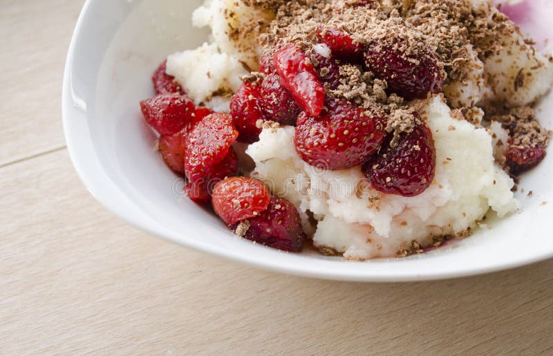 Semolina Pudding Served with Fresh Fruit Strawberries and Sprinkled