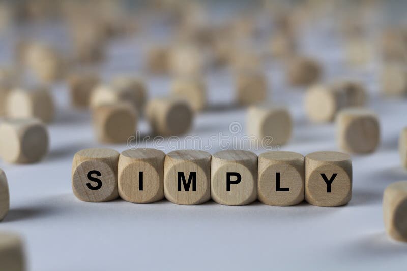 Semplicemente - cubo con le lettere, segno con i cubi di legno fotografia stock libera da diritti Semplicemente - cubo con le lettere, segno con i cubi di legno fotografia stock libera da diritti