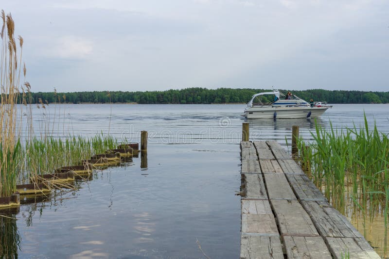 Boat mooring and motor yacht on the lake Senftenberger See.