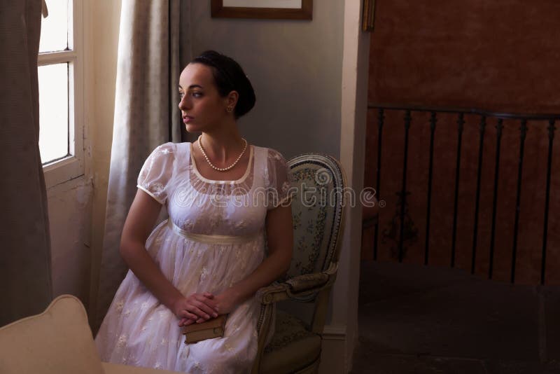 Senhora no vestido da regência foto de stock Senhora no vestido da regência foto de stock