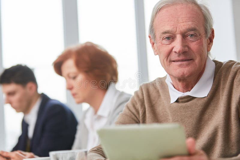 Senior as competent consultant royalty free stock photography