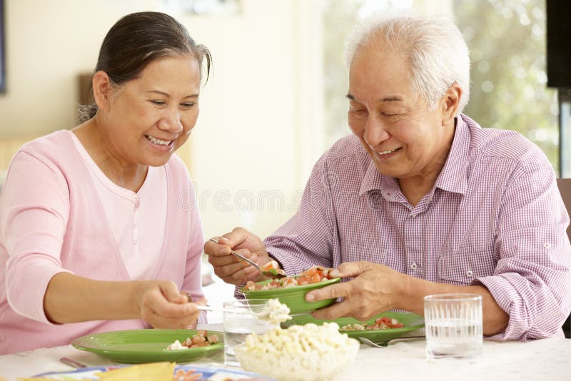 Senior Asian Couple Sharing Meal At Home Stock Photo Image Of Food