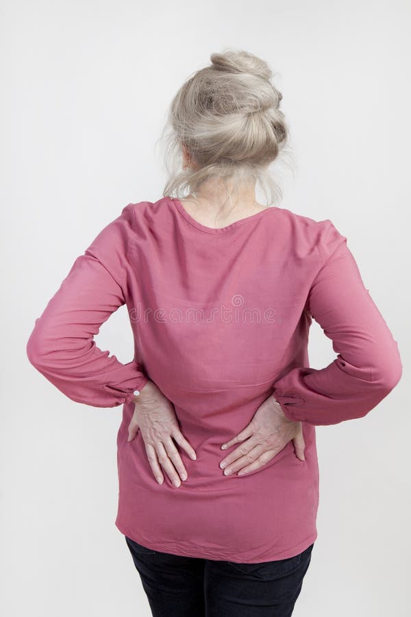 Senior with back pain stock image