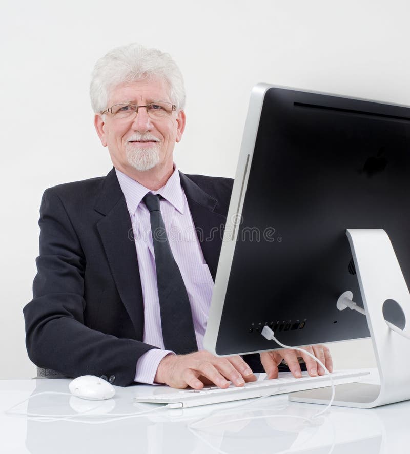 Senior businessman with computer