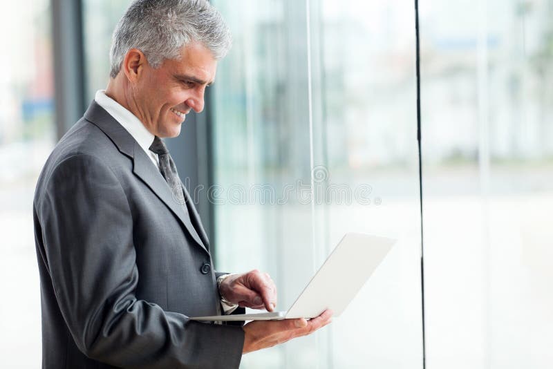 Senior businessman working stock photos