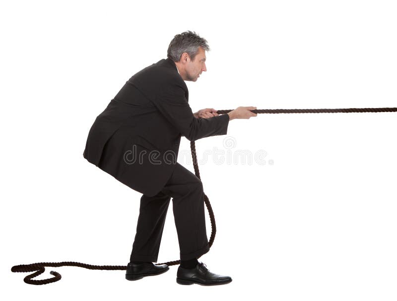 Senior businessmen pulling a rope royalty free stock photography
