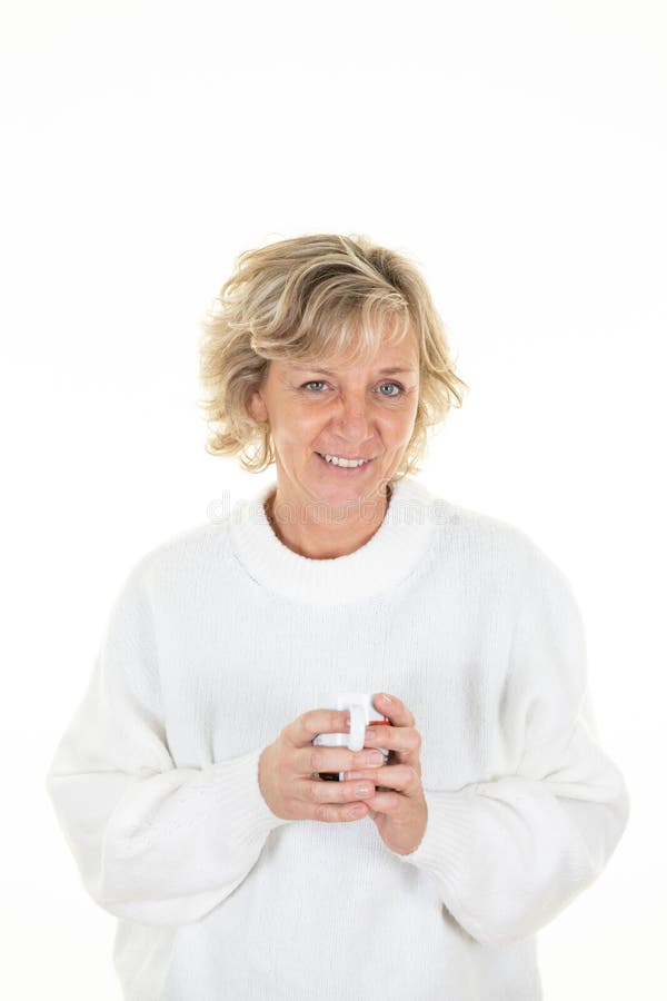 Senior Cheerful Sixty Year Old Blonde Mature Woman Holding Coffee Mug