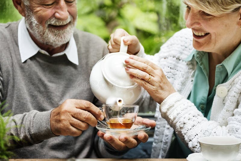 Senior Couple Afternoon Tea Drinking Relax Concept