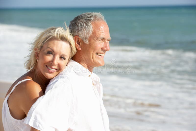 Senior Couple Enjoying Beach Holiday