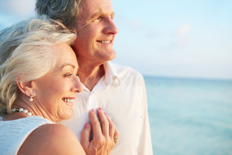 Senior Couple Getting Married In Beach Ceremony