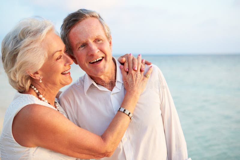 Senior Couple Getting Married In Beach Ceremony