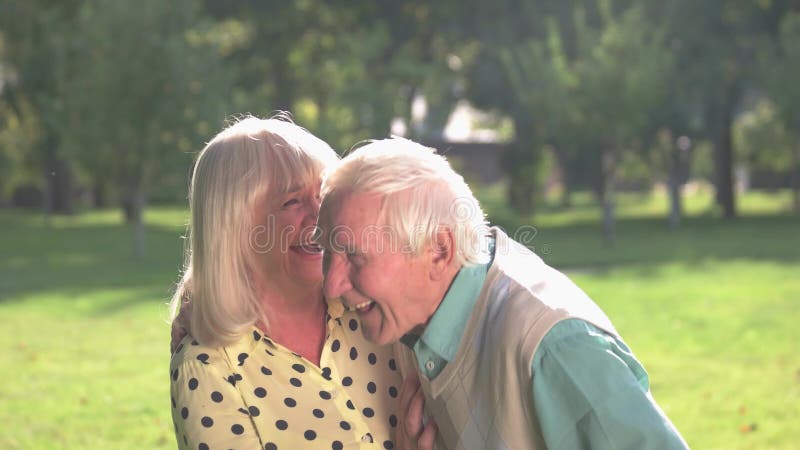 Senior couple is laughing.