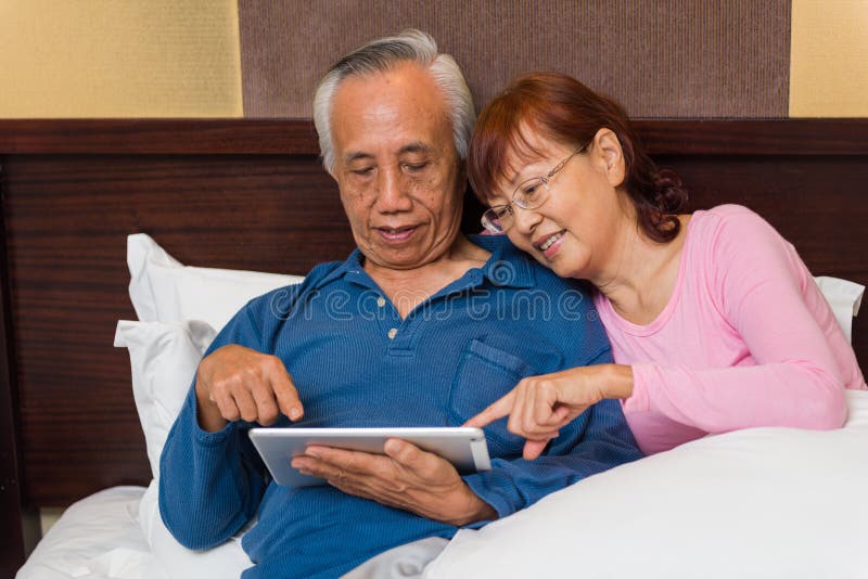 Senior couple learn new technology