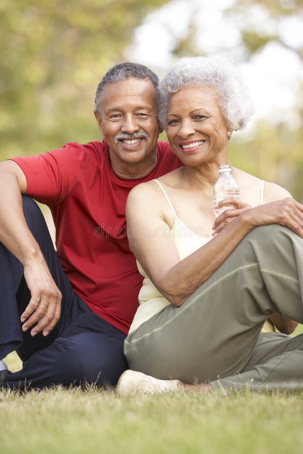 Senior Couple Resting After Exercise royalty free stock photos
