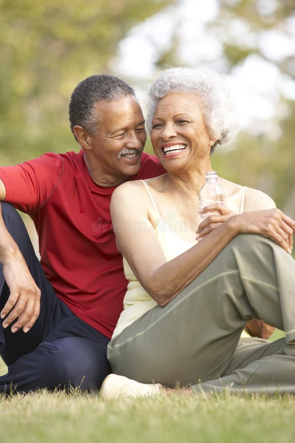Senior Couple Resting After Exercise royalty free stock images