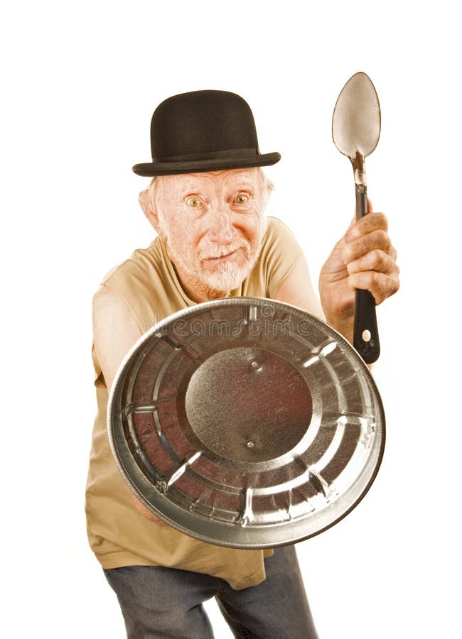 Crazy Man Defending Himself with Can Lid and Spoon Stock Photo Image