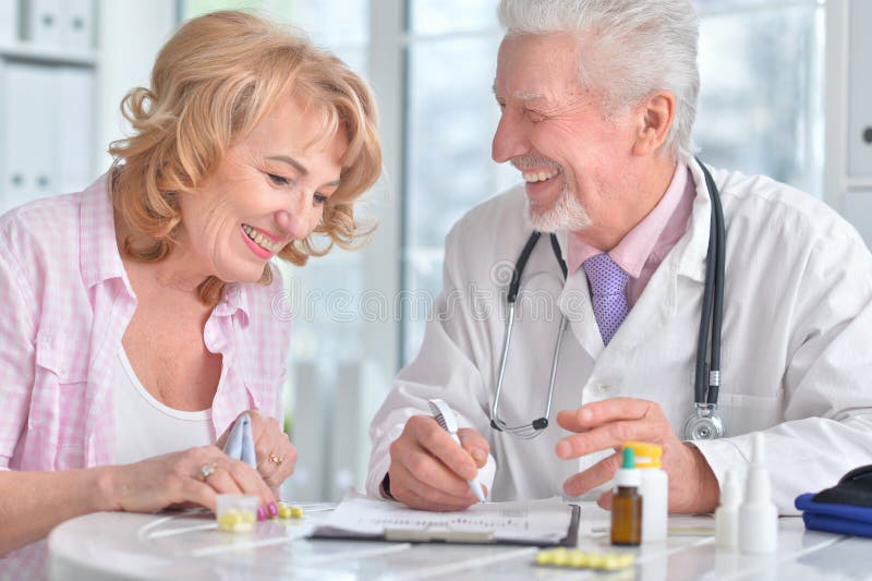 Senior doctor with elderly patient