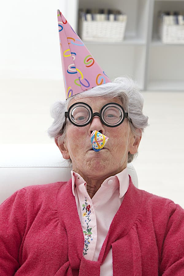 Senior in einer Partei lizenzfreies stockbild Senior in einer Partei lizenzfreies stockbild