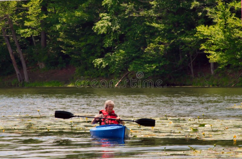 Senior female kayaking