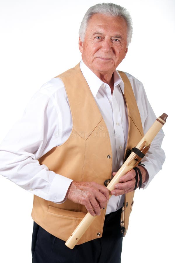Senior with flute stock image