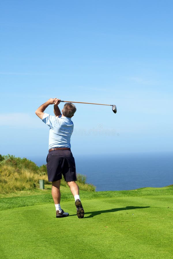 Senior golfer playing golf