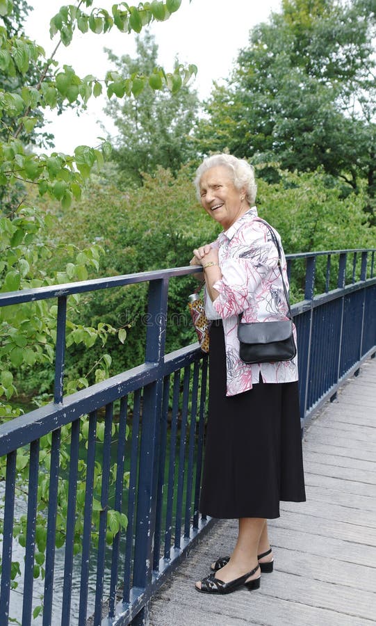 Senior lady on bridge