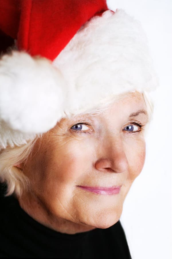 Senior lady with santa hat