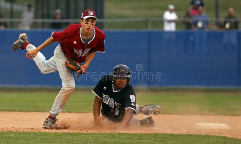 BANGOR, MAINE - AUGUST 18: Seth Freudenberger of Maine District 3 (Bangor East/West L.L.) leaps out of the way of a sliding Elijah Carter of U.S. East (South Vineland L.L., New Jersey) at second base at the 2010 Senior League Baseball World Series on August 18, 2010 in Bangor, Maine. BANGOR, MAINE - AUGUST 18: Seth Freudenberger of Maine District 3 (Bangor East/West L.L.) leaps out of the way of a sliding Elijah Carter of U.S. East (South Vineland L.L., New Jersey) at second base at the 2010 Senior League Baseball World Series on August 18, 2010 in Bangor, Maine.