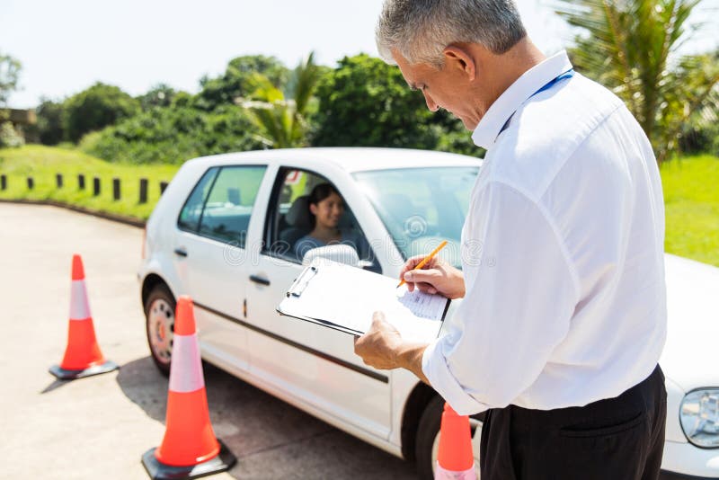 Senior male driving instructor royalty free stock images
