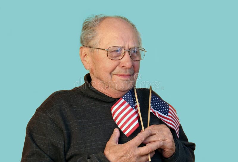 Senior man with american flag isolated