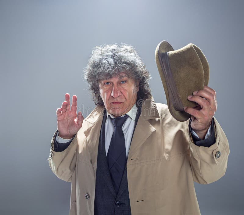 The Senior Man As Detective or Boss of Mafia on Gray Studio Background