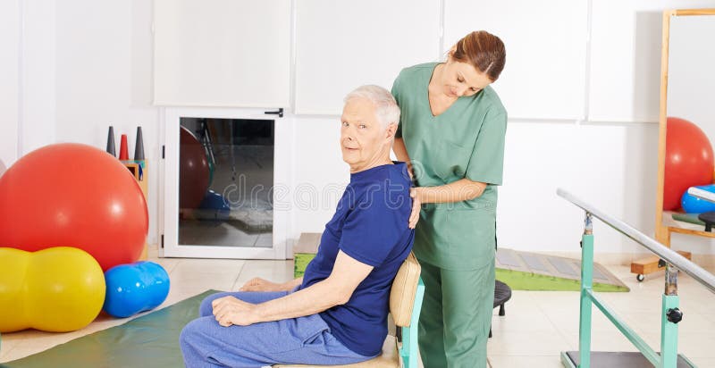 Senior man with back pain in physical therapy royalty free stock photos Senior man with back pain in physical therapy royalty free stock photos