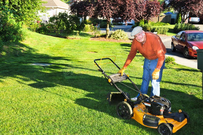 Senior Man Cutting Grass stock photo. Image of green 23767108