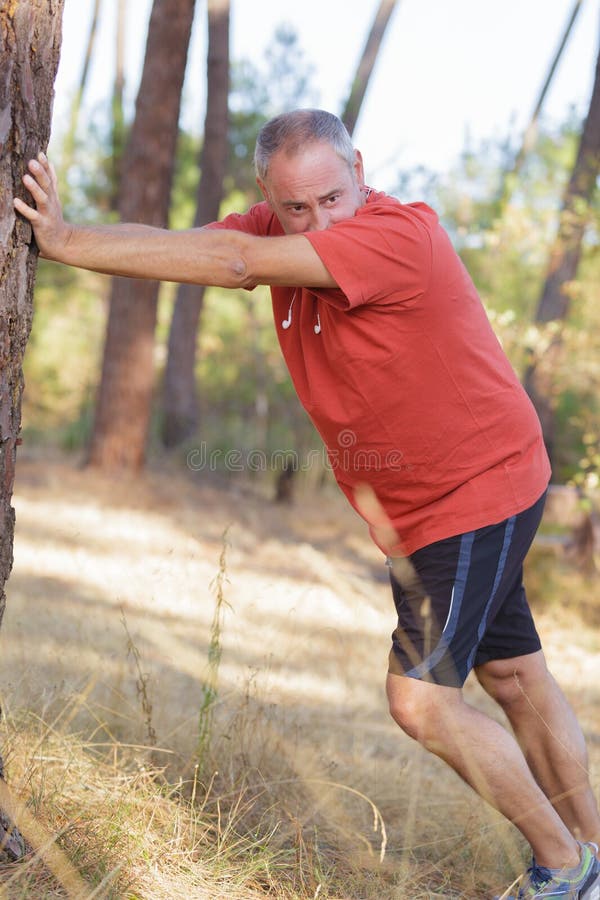 Senior man doing sport outdoors stock images