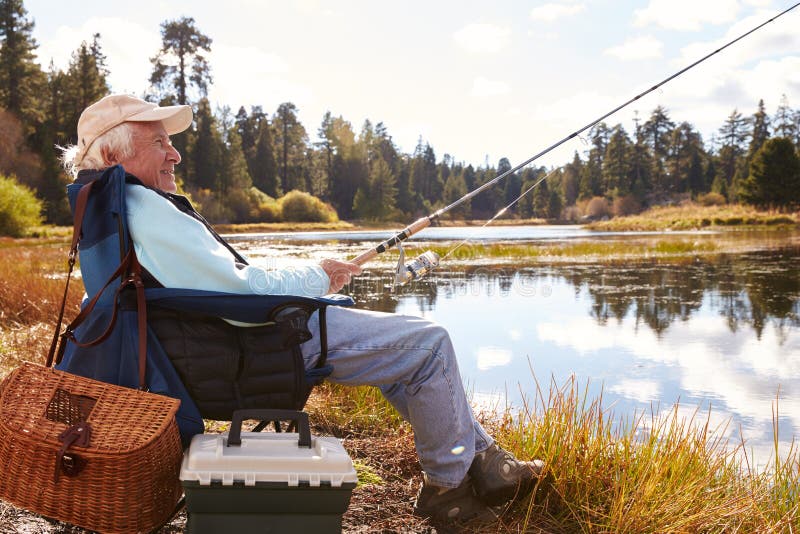 Senior Man Fishing in a Lake, Big Bear, California, Close-up Stock ...