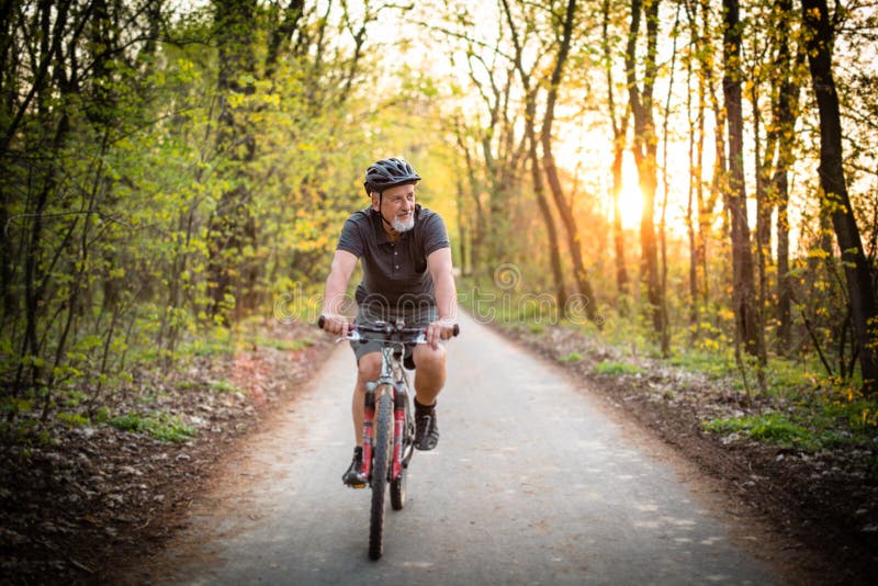 Senior man on his mountain bike outdoors