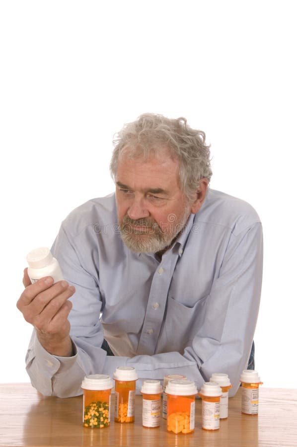 Senior Man with Medicine stock photography