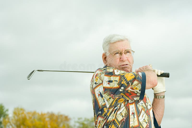 Senior man playing golf stock image. Image of lonely 62809039