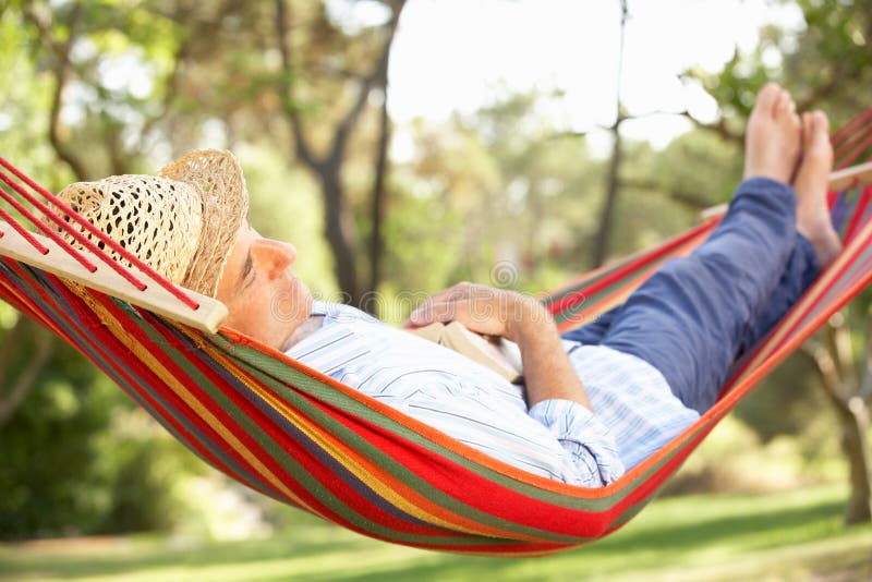 Senior Man Relaxing In Hammock Royalty Free Stock Photography Image