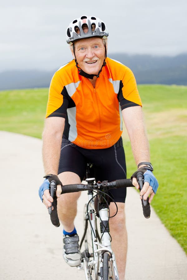 Senior man riding bicycle stock image. Image of adult - Senior Man RiDing Bicycle 22807529