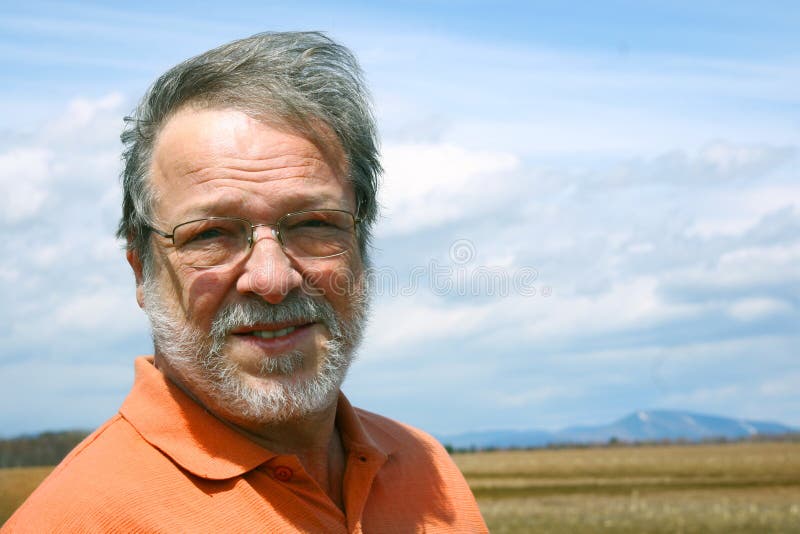 Senior man smiling stock image