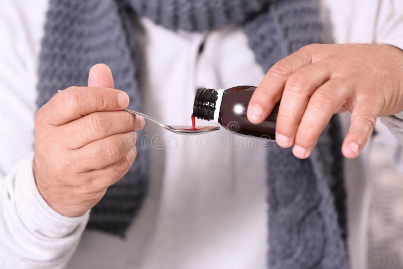 Elderly Person Taking Cough Syrup Stock Photos Free & RoyaltyFree