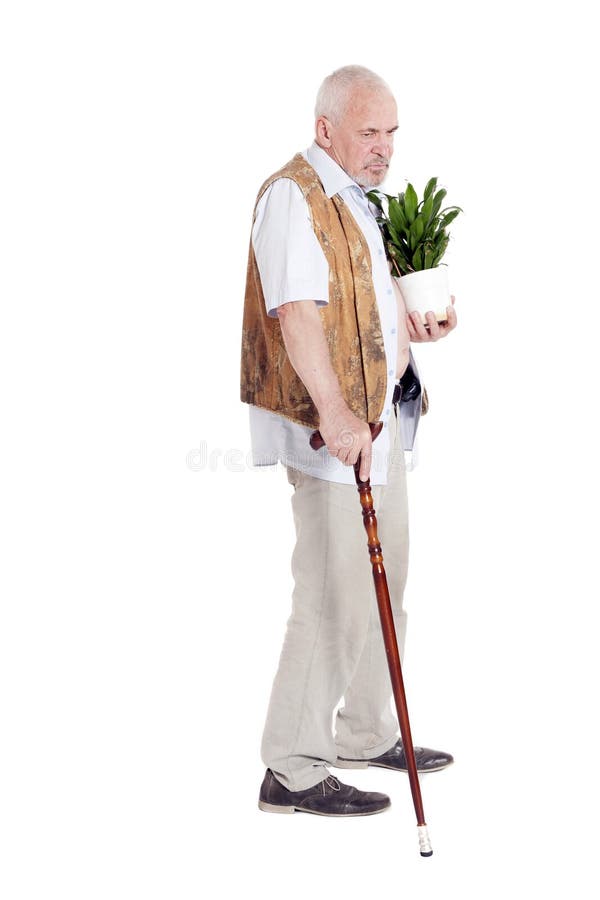 Senior man walking with a cane