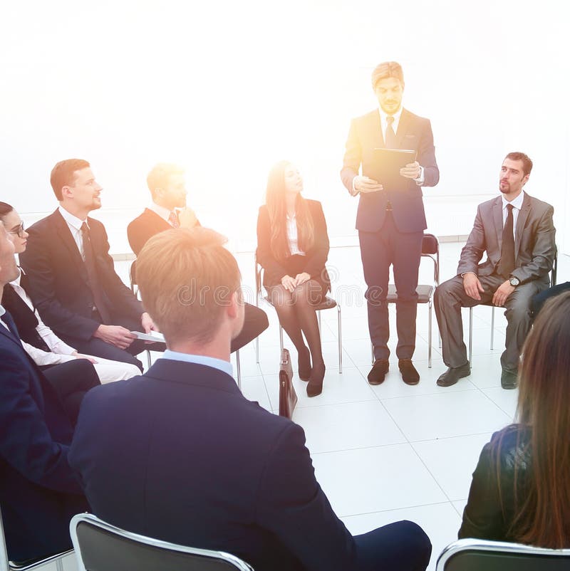 Manager reads a report for the business team. stock image