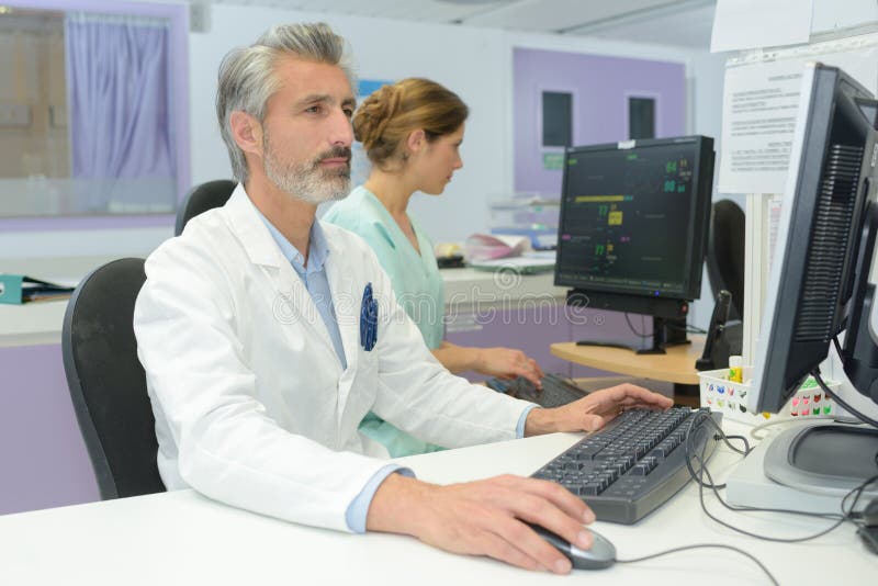 Senior Medical Worker Using Computer Stock Image Image of computing