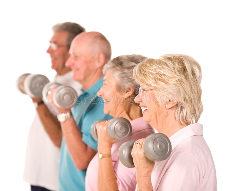 Group of older senior people lifting weights in the gym. Group of older senior people lifting weights in the gym