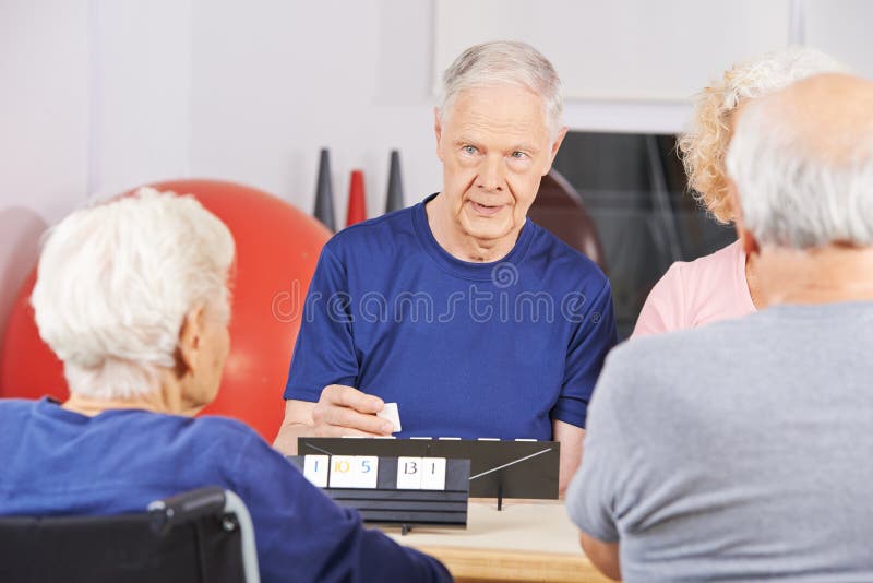 Gameplay Of Rummikub Board Game Stock Photo - Download Image Now