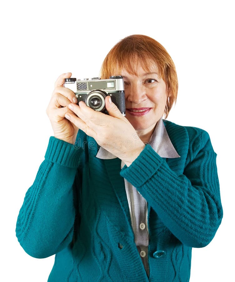 Senior photographer with analog camera
