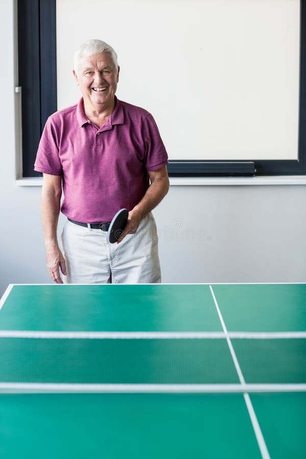 Senior playing pingpong stock photo. Image of entertainment 77686636